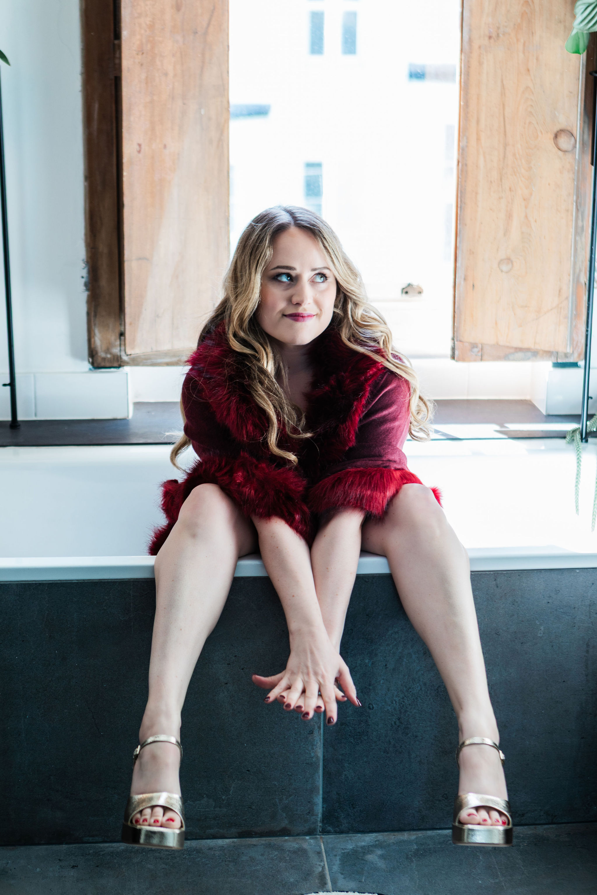 Chantelle, perched on the edge of the bath